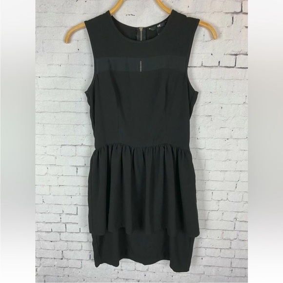 H&M Women's Sleeveless Black Layered Peplum
Mini Dress Size 12 - Picture 1 of 7